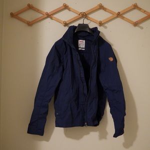 Blue fjällräven jacket with hood.